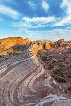Fire Wave in evening light, rock formation, Sleeping Lizard behind, Valley of Fire State Park, Nevada, USA