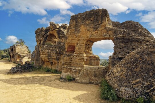 Relics of ancient rock tombs, Arcosol tombs (Arcosolia), Valley of the Temples, Valle dei Templi, near Agrigento, Sicily, Italy, Mediterranean Sea