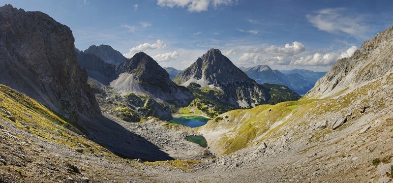 Mountain panorama above the Drachensee and the Coburger H&uuml;tte with the mountain peaks of the Sonnenspitze, Drachenkopf, Coburger H&uuml;tte, Ehrwalder Alm, Ehrwald, Mieminger Gebirge, Tyrol, Austria