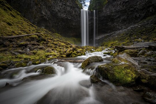 Waterfall cascading over rocky outcrop, Tamanawas Falls, long exposure, Cold Spring Creek, Oregon, USA