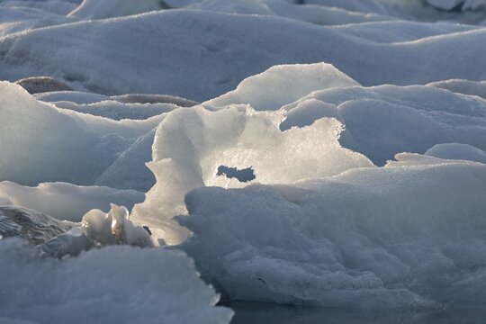 Icebergs in the evening light, Joekulsarlon glacial lake, southern coast of Iceland, Atlantic Ocean