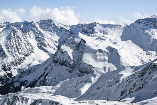 Snow-covered mountain ranges, view from the Geierspitze, avalanche barrier on the Schmittenberg, Wattentaler Lizum, Tux Alps, Tyrol, Austria