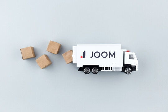 The truck with the emblem JOOM. Trade tariffs and competition.
