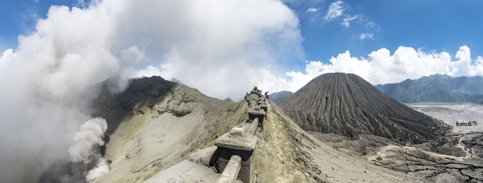 Crater rim of the smoking volcano Gunung Bromo, in the back Mt. Batok, National Park Bromo-Tengger-Semeru, Java, Indonesia