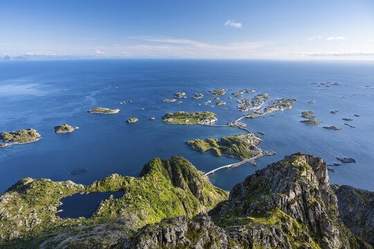 View of fishing village Henningsvaer from the top of Festv&aring;gtinden, Small islands connected by road and bridges, Austv&aring;g&oslash;ya, Lofoten, Norway