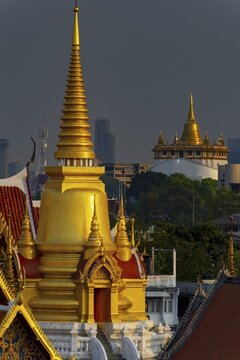 The chedi from Wat Tri Thotsathep Worawihan, behind it the Golden Mount, Bangkok, Thailand