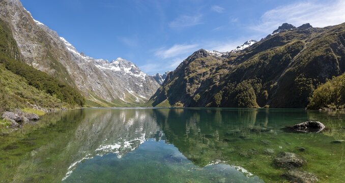 Reflection in Lake Marian, Fiordland National Park, Te Anau, Southland, South Island, New Zealand
