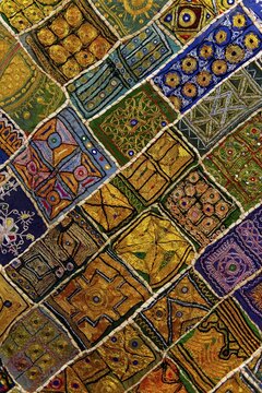 Colourful traditional wall hanging from Rajasthan, inlaid with small mirrors, Rajasthan, India