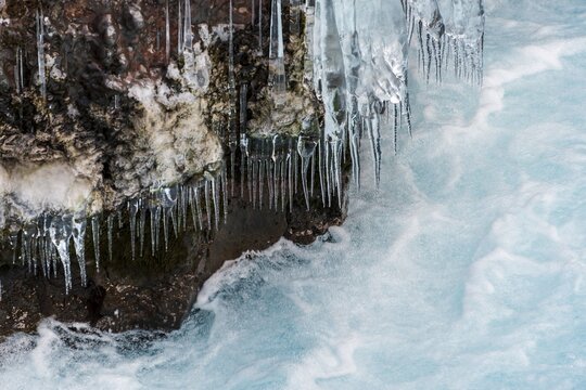 Icicles on the river Hv&iacute;t&aacute;, near the Hraunfossar Falls, Western Region, Iceland