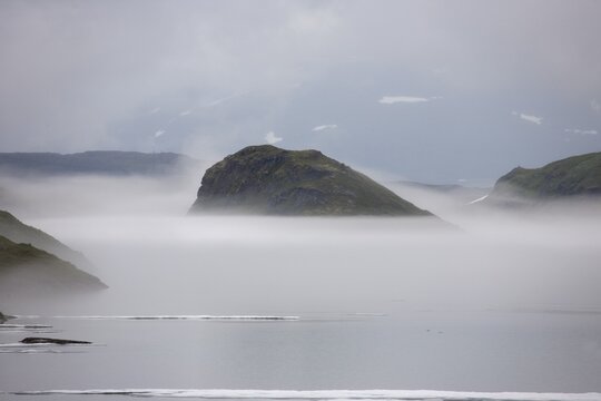 Mist forming over a mountain lake, Vikafjell, Norway, Scandinavia, Europe