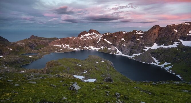 Sunset with dramatic clouds, hike to Hermannsdalstinden, lakes Krokvatnet, mountains, Moskenes&oslash;ya, Lofoten, Nordland, Norway