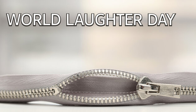 Zipper opening forming smile with world laughter day text happiness concept