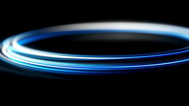 Abstract blue and white light trails spinning in a futuristic circle creating a mesmerizing energy tunnel on a black background representing speed and innovation