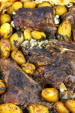Freshly backed lamb meat with potatoes close up