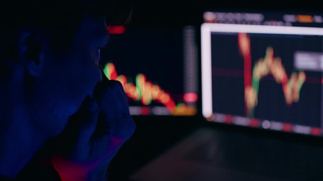 Close View Of Cryptocurrency Charts On Multiple Screens With Red And Green Candlestick Patterns Showing Market Fluctuation And Technical Analysis In Dark Environment Concept