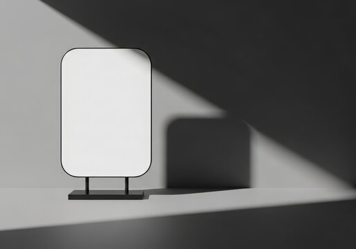 A white rectangular object on a shelf with a light shining on it