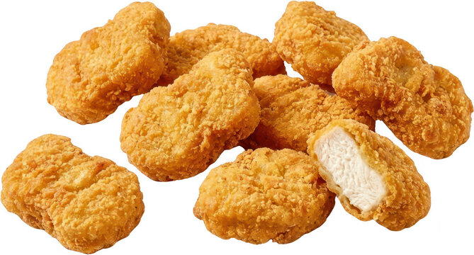 A pile of golden brown crispy fried chicken nuggets with one nugget showing its tender white interior 171 food poultry snack fast food appetizer breaded cooked white meat