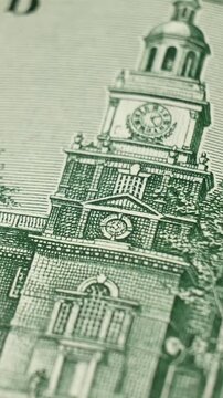 Hundred dollar bill reverse side displaying Independence Hall. Government backed currency, financial stability, trade, structured banking operations, ensuring trust in national monetary framework
