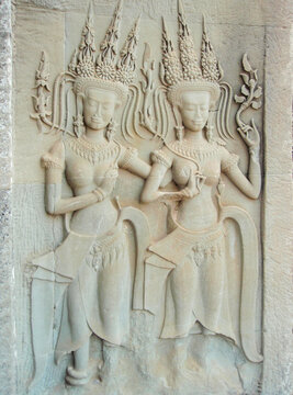 Siem Reap, Cambodia - February 20, 2017: Dancing apsaras at the ancient temple of Angkor Wat