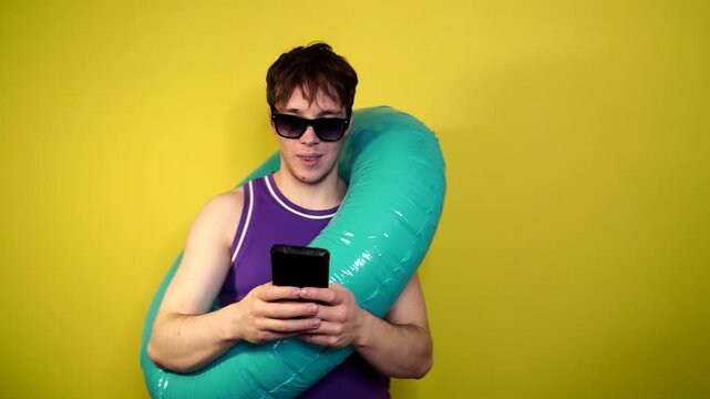 Phone call by cellphone. Attractive charismatic stylish guy has an unpleasant phone
