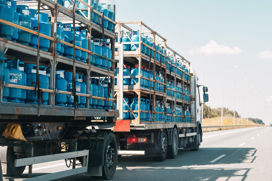 Cargo truck loaded with blue gas tanks