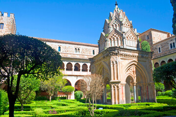 Fototapeta premium Historic Cloister Garden, Guadalupe Monastery, Guadalupe, Spain