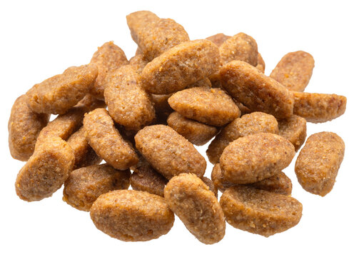 Dry pet food or kibbles on white background. File contains clipping path.