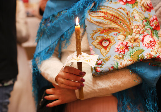 woman holding candle 