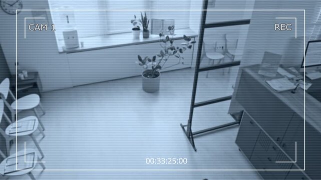CCTV high angle shot of waiting hall with row of chairs and reception desk in modern hospital interior in daytime
