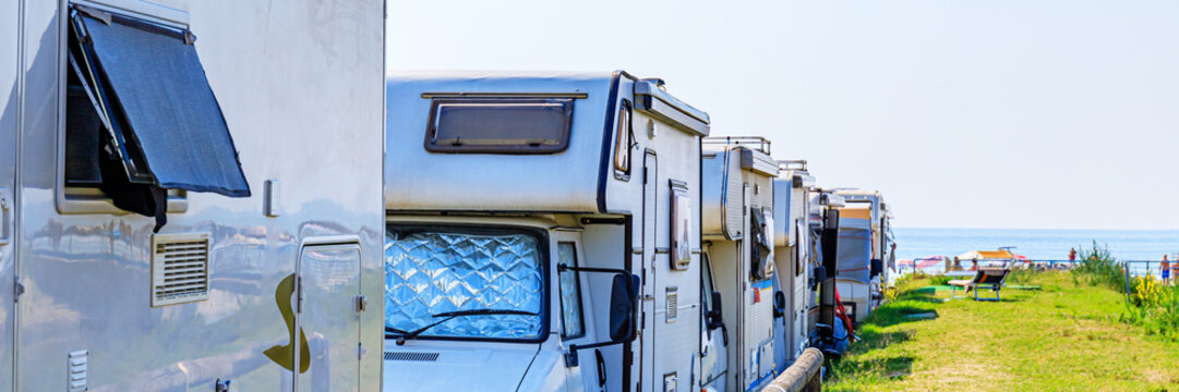 Modern camp site on Popular Tourist Resort at Adriatic Sea. Traveling Europe in motorhome