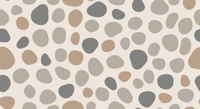 Seamless pattern of scattered, rounded pebbles in earthy tones
