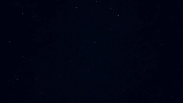 Starry night sky with twinkling stars and deep darkness. A serene backdrop for relaxation, inspiration, and creativity