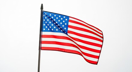 Fototapeta premium Celebrating flag day a waving american flag on a pole patriotic symbolism