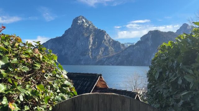 Mountains lake foliage traunstein sunny