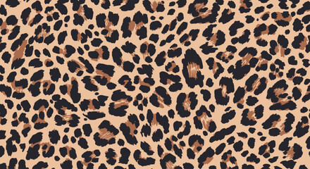 A full-frame close-up shot of a beige and black leopard print pattern © AJI T