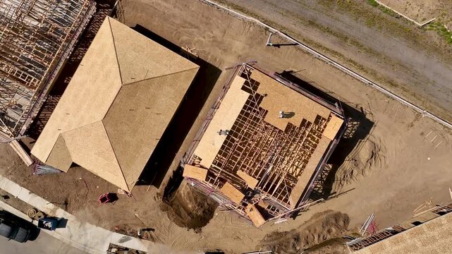 Static Top-Down Aerial Shot of Active Residential Housing Construction Site Development.