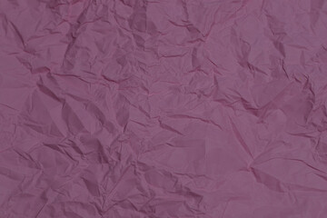 Fototapeta premium Pink crumpled paper texture as background
