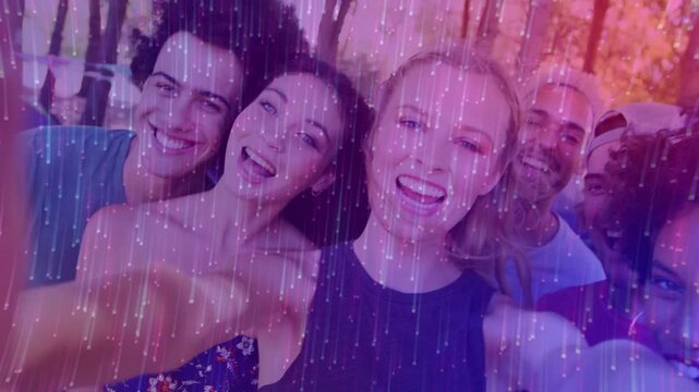 Six friends extending arm taking selfie, pink sparkles overlay animating smiles for social media