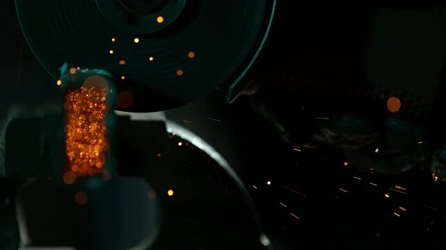 Super Slow Motion of Working Metal Cutter in Workshop. Detail shot, low depth of focus.. Filmed on High Speed Cinema Camera, 1000 fps.