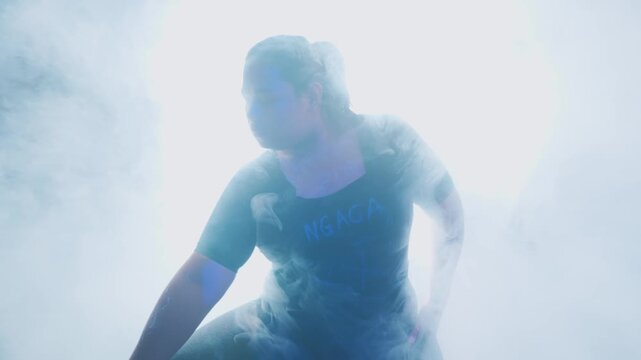 Dramatic Silhouette in Smoke and Light