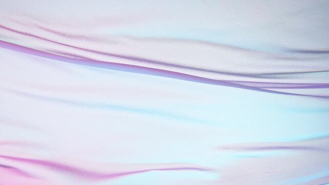 Super Slow Motion of Waving Silver Cloth. Filmed on High Speed Cinema Camera, 1000 fps