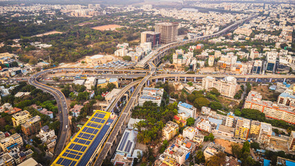 Obraz premium Aerial view of traffic congestion at Silk Board junction in Bangalore, highlighting urban population density and transport challenges in India