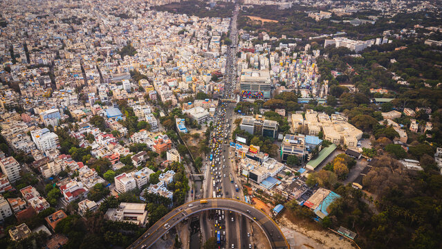 Aerial view of traffic congestion at Silk Board junction in Bangalore, highlighting urban population density and transport challenges in India