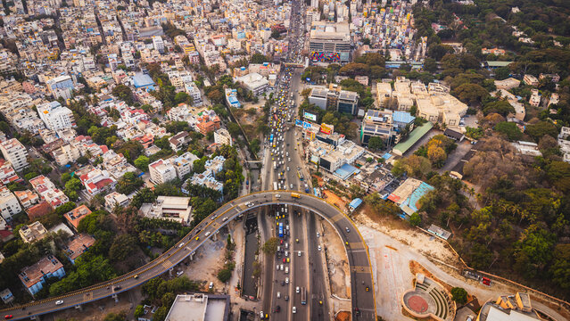 Aerial view of traffic congestion at Silk Board junction in Bangalore, highlighting urban population density and transport challenges in India