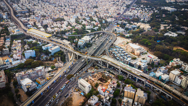 Aerial view of traffic congestion at Silk Board junction in Bangalore, highlighting urban population density and transport challenges in India