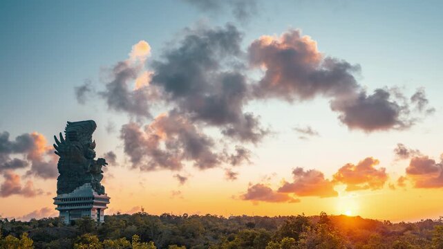 Bali famous landmark and popular travel destination 122-meter statue located in Garuda Wisnu Kencana Cultural GWK Park Bali, Indonesia 4K