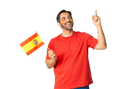 Spanish football fan celebrating world cup victory pointing up