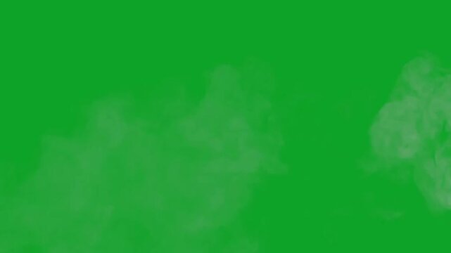 Realistic white smoke plume billowing and drifting on a green screen background