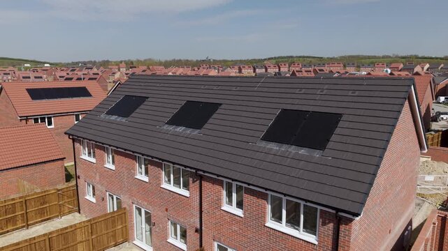 close up footage of integrated solar panels on new build house