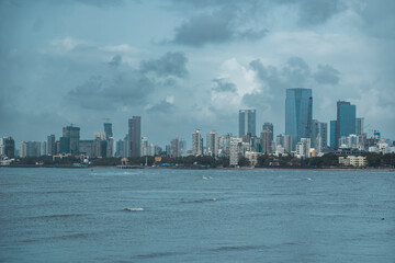 Obraz premium Modern City high-rise skyscraper buildings. Aerial drone view of the Financial District in Mumbai. Daytime Mumbai City, India.